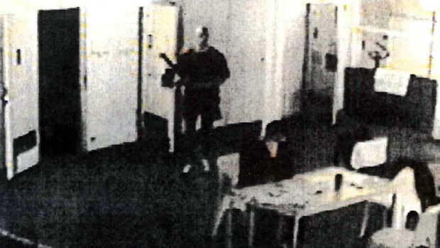 Prison CCTV captures the moment prisoner Matt Johnson ambushes Carl Williams, who was reading a newspaper before he was fatally bashed. It wasn't <i>The Age</i>.