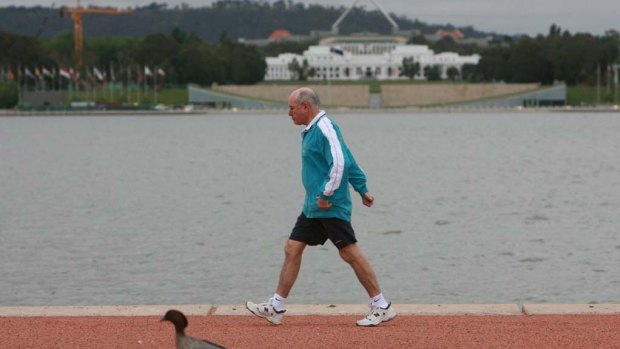 Former prime minister John Howard was a familiar figure power walking in the streets.
