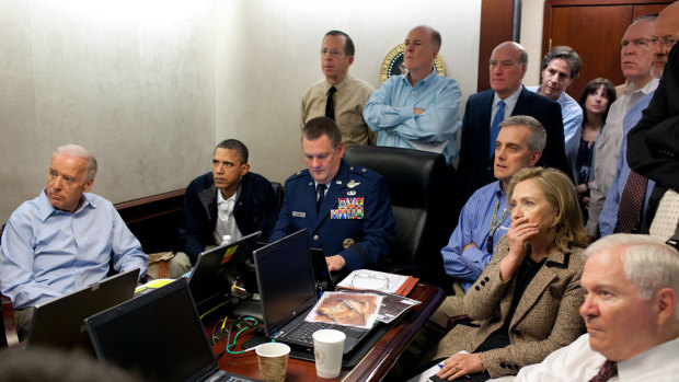 US President Barack Obama and senior White House aides and officials watch the operation that ended in the killing of Osama Bin Laden in Abbottabad, Pakistan. James Clapper can be seen standing on the far right.