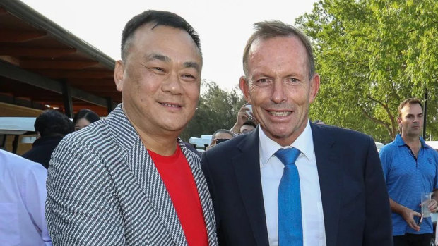 Jack Lam and Tony Abbott at the Twin Creeks Golf and Country Club in 2018. 