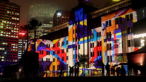 A vivid city blending old and new ... Circular Quay during the Vivid festival.