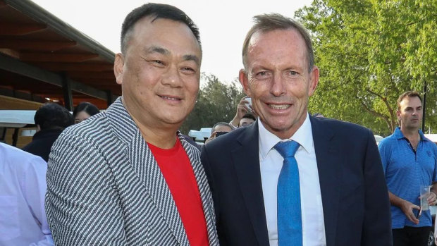 Jack Lam and Tony Abbott the Twin Creeks Golf and Country Club in 2018. 