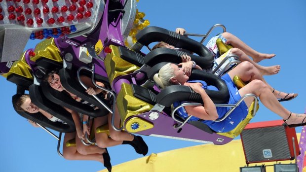 The Royal Canberra Show. In sideshow alley on the Extreme ride, Tracey Warrington of Latham on the ride with her 10 year old son Jake, at right.