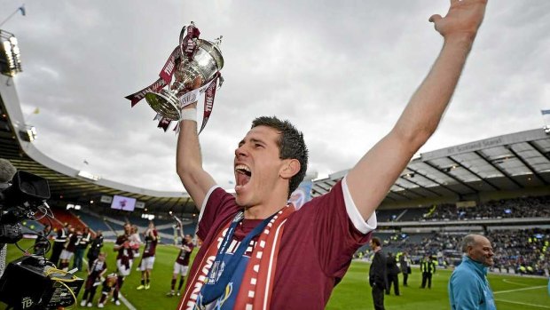 Ryan McGowan celebrates after winning the Scottish Cup with Hearts.