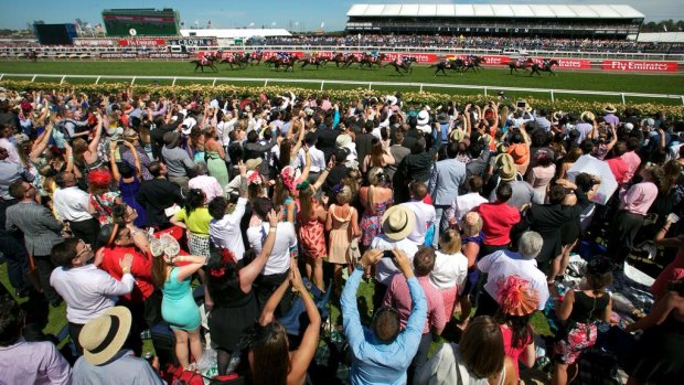This year will be the first Melbourne Cup without a large crowd urging on the horses. 