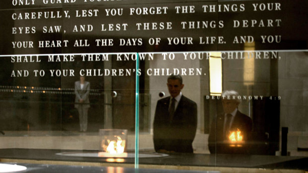 Former US president Barack Obama with Elie Wiesel, Holocaust survivor and founding chairman of the United States Holocaust Memorial Council at the Hall of Remembrance at  the Holocaust Memorial Museum in Washington, DC.