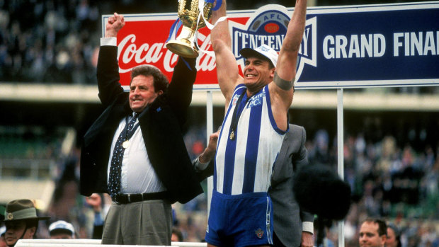 Alpha: Wayne Carey with coach Denis Pagan after the 1996 grand final.