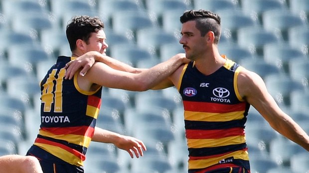 Crows captain Taylor Walker wants to know why Mitch McGovern wants out.