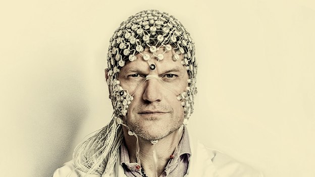 Neurologist Steven Laureys wearing an EEG, or electroencephalogram, used to test electrical activity in the brain.