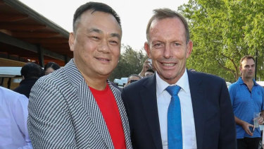 Jack Lam and Tony Abbott the Twin Creeks Golf and Country Club in 2018.