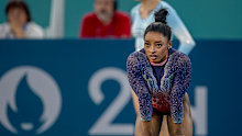 Simone Biles prepares to perform her routine at the Paris 2024 Summer Olympic Games.