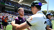 Then-England captain Ben Stokes shakes hands with Australia captain Pat Cummins after losing the Ashes.