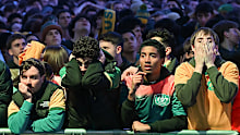 Fans watch the FIFA World Cup loss. 