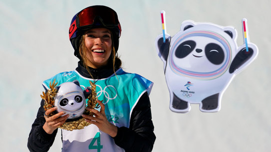 Composite: Eileen Gu holds the Winter Games mascot Bing Dwen Dwen, the mascot.