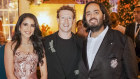 Bride Radhika Merchant, Mark Zuckerberg and groom Anant Ambani at the couple’s pre-wedding bash in Jamnagar, India.