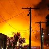 Exploding paint tins as business, house fire light up Brisbane CBD
