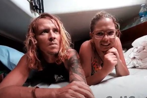 Jake and Tamara somewhere in the Pacific Ocean, vlogging about their yacht taking on water.