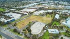 The 2.3ha vacant L-shaped site sold with a 12-month lease back to Telstra.