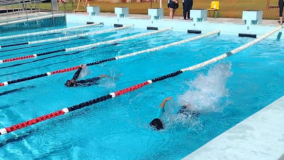 Local children swim in the Batlow pool.