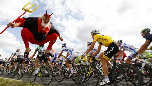 Thousands of fans pack the route for the Tour de France every year.