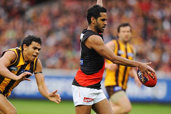 Andrew Lovett playing for Essendon in 2009.