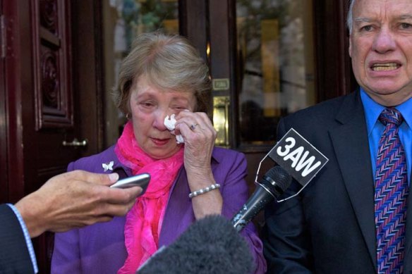 Joy and Roger Membrey face reporters outside court after Shane Bond was acquitted in 2012.