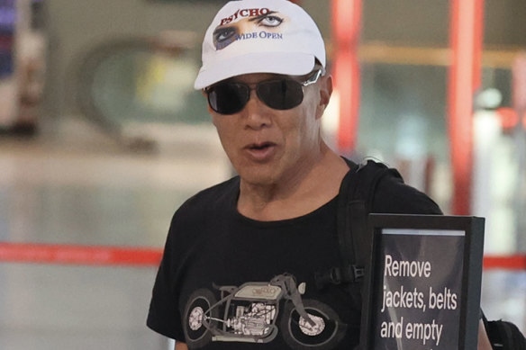 Charlie Teo was spotted at Sydney Airport on Thursday, sporting a cap with the logo ‘Psycho: Eyes Wide Open’.