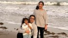 Ali, Faiza and their daughter.