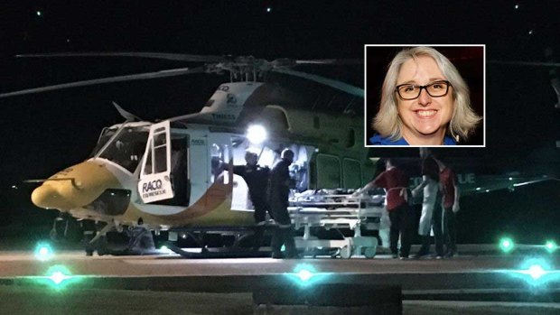 The RACQ CQ Rescue helicopter lands at Mackay Base Hospital with shark attack victim Justine Barwick, inset.