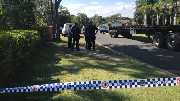 The injured mother and son ran out onto the Hervey Bay street and flagged down neighbours after being stabbed in the neck and torso.