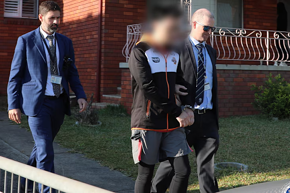 Children’s author Oliver Phommavanh is arrested in May 2024 at a home in Old Guildford.