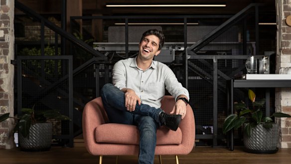 Afterpay co-founder Nick Molnar can't wipe the grin off his face as his company's share price rockets despite a money laundering investigation by regulator Austrac. 