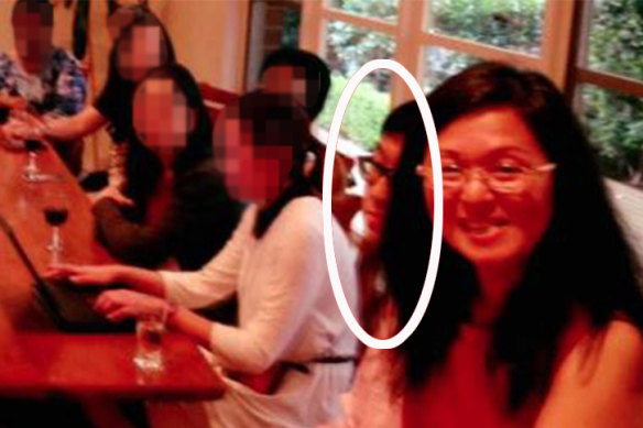 Nick Zhao (circled) sitting next to Federal Liberal MP Gladys Liu at a meeting at her house in 2016.