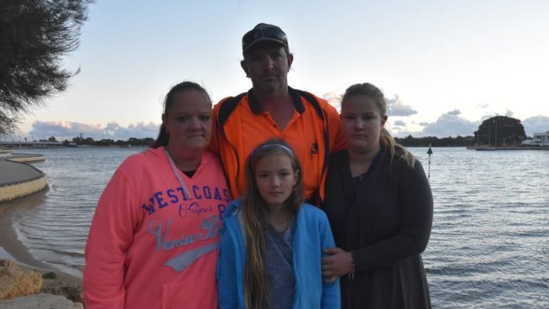 Kristy and John James and their children Kiara and Chelsea were returning from a family fishing trip when they witnessed a boat rounding up and chasing a group of dolphins in Mandurah.