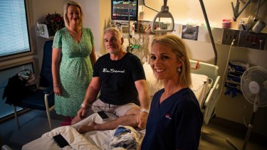 Newcastle Knights legend Tony Butterfield was saved when Colinda Holmes, left, and Rachael Paton, right, were able to keep him alive after he suffered a heart attack at No. 2 Sportsground on Saturday. 