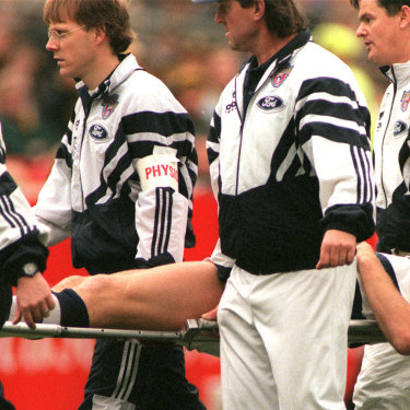 Geelong’s John Barnes is stretchered off in 1996.