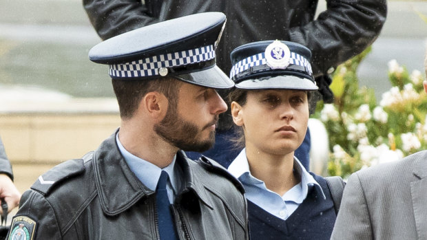 Constable Sam Marshall (left) and Senior Constable Jacqueline Buchanan arrive at the NSW Coroners Court on Wednesday.