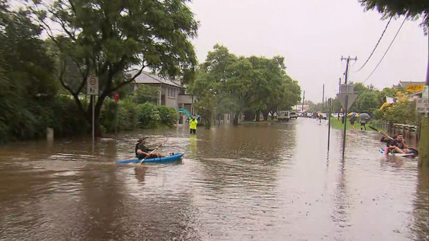 People kayaking through the streets of Penrith on Sunday.