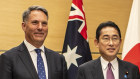 Defence Minister Richard Marles (left) with Japanese Prime Minister Fumio Kishida in Tokyo on Friday.