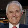 Malcolm Turnbull skips pleasantries as rain falls on marriage equality parade
