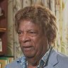 Kamahl was charged with stalking a woman. 