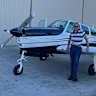 Pilot David Stephens with his 1966 Beechcraft Debonair plane.