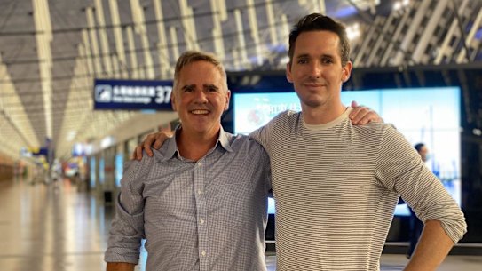 AFR journalist Mike Smith with ABC journalist Bill Birtles as they prepared to leave China on Monday night.