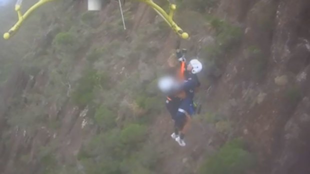 The bushwalkers were winched to safety after narrowly avoiding tragedy at Mt Beerwah.