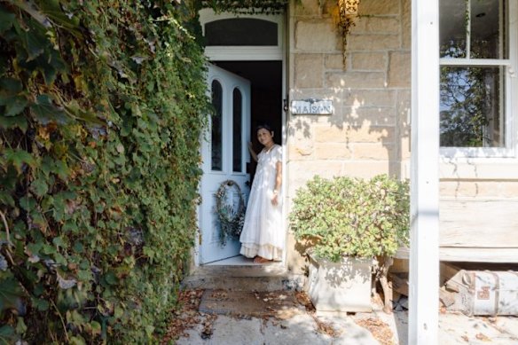 The heritage-listed worker’s cottage retains original features like hand-chipped walls. 