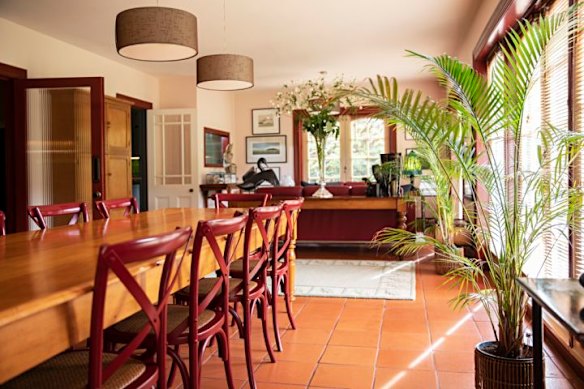 A light-filled sunroom spills out to the north-facing back garden. 