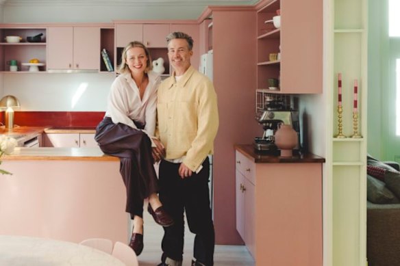 Stuart and Chelsea in their updated DIY kitchen.
