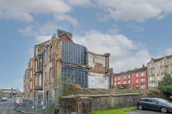 Tarpaulin on the west wall. 
