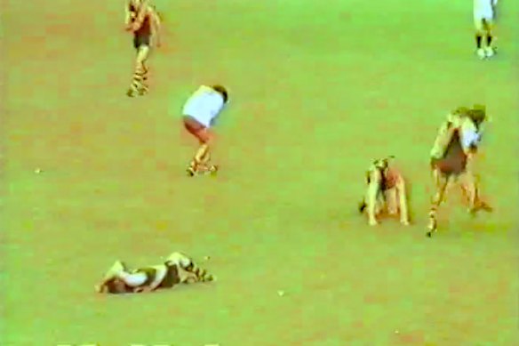 Players are laid out on the field. 
