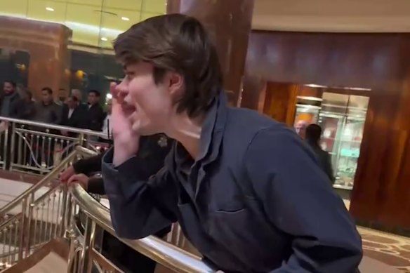 A screenshot of neo-Nazi associate Hugo Lennon being ejected overnight by police from the Melbourne hotel where Indian Prime Minister Narendra Modi was staying.